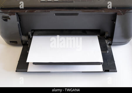 White paper in black printer toner and colors Stock Photo