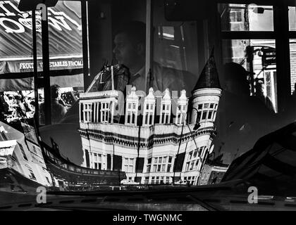 black and white reflection in london bus windscreen of kentish town Assembly house pub London Stock Photo