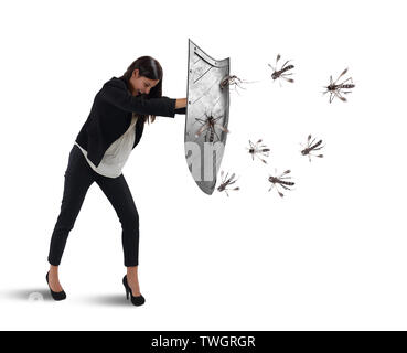 Woman defends herself from the attack of mosquitoes with a shield Stock Photo