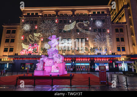 New year decoration in front of Beijing Department Store on Wangfujing Street in Beijing, China Stock Photo