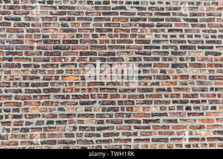 Brown red color brick wall texture, background. Traditional building facade Stock Photo