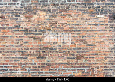 Brown red color brick wall texture, background. Traditional building facade Stock Photo