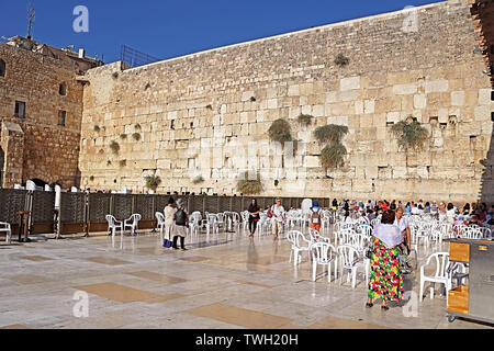 JERUSALEM, ISRAEL - SEPTEMBER 20, 2017: Unidentified pilgrims and tourists near the Wailing Wall (women part) Stock Photo