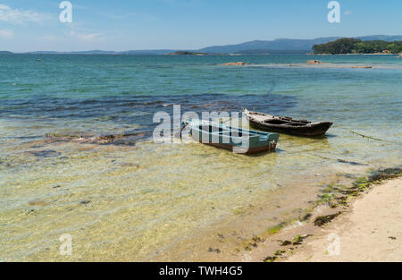Small boat on the sea called Chalana a typical small vessel propelled on water by oars. Rias Baixas seascape Stock Photo