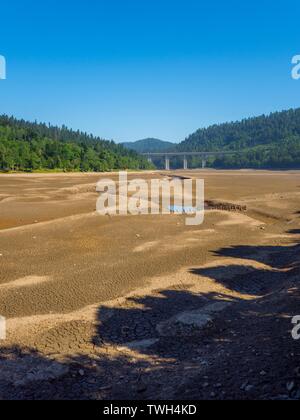 Dried lake-bed Bajer in Fuzine Croatia Spring 2019 earth terrain with isolated small ponds