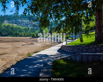 Dried lake-bed Bajer in Fuzine Croatia Spring 2019 coastline promenade