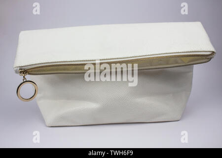 The black women's handbag with chain on white background Stock