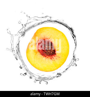 Half of yellow peach in water splash Stock Photo