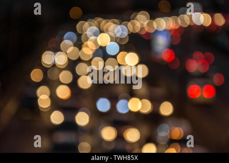 Out of focus car traffic, in Sao Paulo, Brazil. Mainly the lights are red, white, blue and yellow. Stock Photo