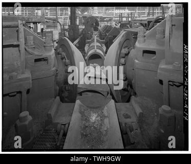 Rotary roller of no. 2 seamless line in bays 19 and 20 of the main pipe mill building looking north. - U.S. Steel National Tube Works, Main Pipe Mill Building, Along Monongahela River, McKeesport, Allegheny County, PA; Carnegie, Andrew Stock Photo