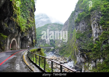 Amazing view of Taroko Gorge in Taroko National Park, Taiwan. Taiwanese landscape. Steep rocks along river, green forest. Misty fog, rainy weather. Asian nature. Amazing places. Stock Photo