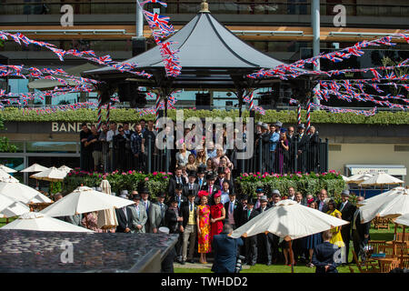 Ascot, Berkshire, UK. 20th June, 2019.  Guests and TV presenters pose for a pre opening photo on the Bandstand on Ladies Day at Royal Ascot. Credit: Maureen McLean/Alamy Stock Photo