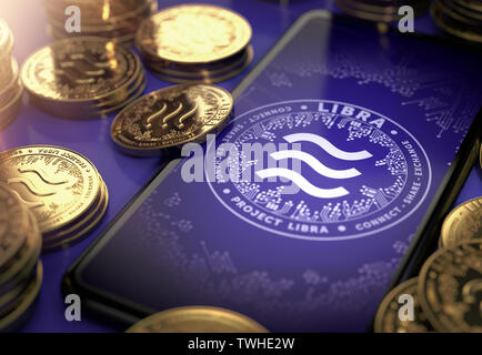 Libra concept coin design on-screen and laying golden Libra concept coins. Libra cryptocurrency in everyday use concept. 3D rendering Stock Photo