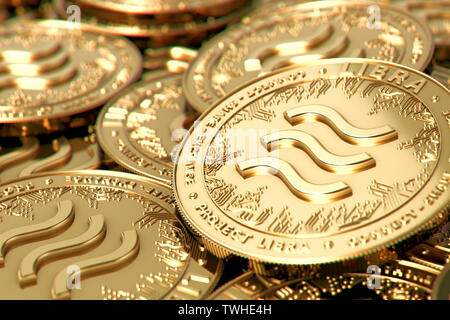 Stack of golden Libra cryptocurrency concept coins in blurry closeup. 3D rendering Stock Photo