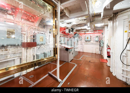 London, United Kingdom - May 13, 2019: HMS Belfast warship museum interior, saw action during the second world war, is now permanently moored as a museum ship on the River Thames in London . Stock Photo