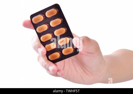 hand showing medicine isolated on white background Stock Photo