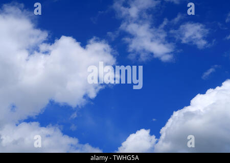 Lots of cloud and a blue sky Stock Photo