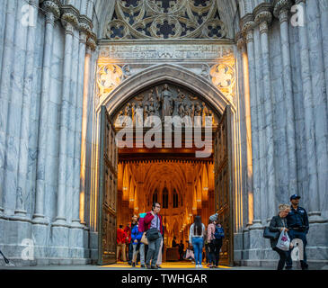 New York, United States, May 3rd, 2019. Tourists at St Patricks cathedral entrance. Manhattan downtown Stock Photo