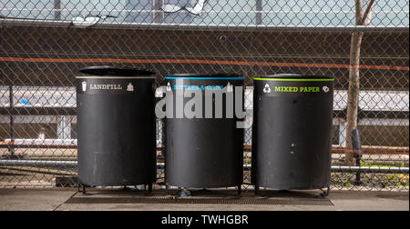 USA, New York. May 4, 2019. Three trash containers for recycling separation, Highline, Manhattan downtown, Stock Photo