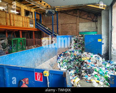 Waste processing plant. Recycling and storage of waste for further disposal. Separate and sorting garbage collection. Stock Photo