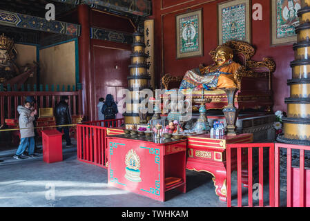 Laughing Buddha in Gate Hall of Harmony and Peace Yonghe Temple also called Lama Temple of the Gelug school of Tibetan Buddhism in Beijing, China Stock Photo