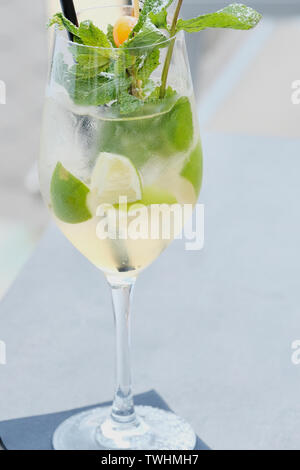 close up photo of summer cocktail Hugo on a restaurant table in Germany Stock Photo