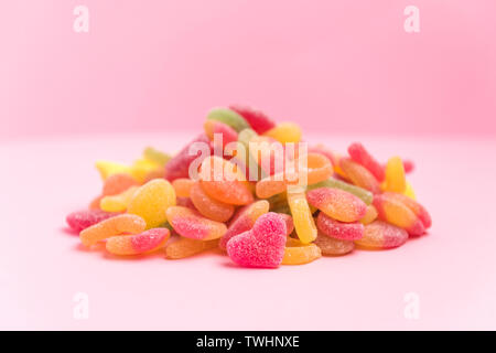 sugary jellies isolated on a pink background Stock Photo