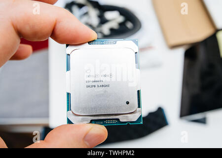 London, United Kingdom - May 15, 2019: Above macro view of new powerful new E5-1680 V4 Intel Xeon professional CPU processor Broadwell FCLGA2011-3 Stock Photo