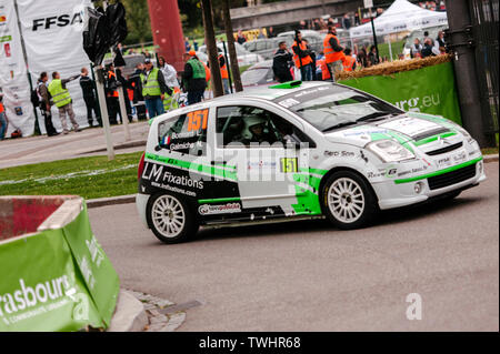 STRASBOURG, FRANCE - OCT 3, 2013: Laurent Bonnard of France compete in Citro n C2 R2 during Super Special Stage 1 of the WRC France Stock Photo