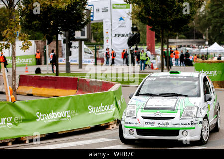 STRASBOURG, FRANCE - OCT 3, 2013: Laurent Bonnard of France compete in Citroen C2 R2 during Super Special Stage 1 of the WRC France Stock Photo