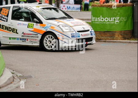 STRASBOURG, FRANCE - OCT 3, 2013: Yannick Wendling of France compete in Citroen C2 R2 during Super Special Stage 1 of the WRC France Stock Photo