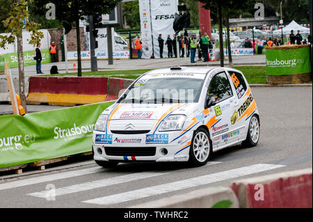 STRASBOURG, FRANCE - OCT 3, 2013: Yannick Wendling of France compete in Citro n C2 R2 during Super Special Stage 1 of the WRC France Stock Photo