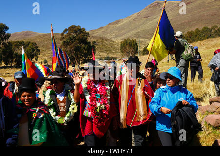 Bolivia 20th June 2019: Bolivian president Evo Morales Ayma (centre) waves to spectators as he leads an International Hike along a section of the Qhapaq Ñan Inca road near Desaguadero. The event was organised by the Ministry of Cultures & Tourism to promote tourism and Bolivia's indigenous cultures. Stock Photo