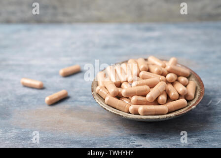 Cat's Claw (Uncaria tomentosa)  Extract Capsules. A Dietary Supplement. Immune System Support. Stock Photo