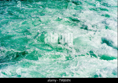 Abstract powerful churning water and rapids in Niagara River, Ontario, Canada. Stock Photo