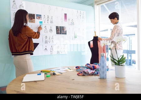 Female fashion designers working in a modern office Stock Photo