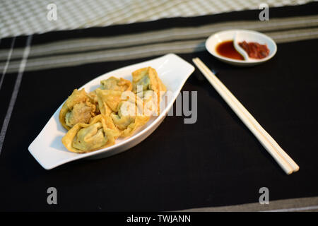 deep fried won ton, setup nicely on a table ready to serve Stock Photo