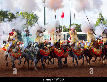 Rabat, Morocco. 20th June, 2019. Performers in traditional costumes ride horses during a Fantasia horse show in Rabat, Morocco, on June 20, 2019. Fantasia is a traditional exhibition of horsemanship performed during cultural festivals and wedding celebrations. Credit: Xinhua/Alamy Live News Stock Photo