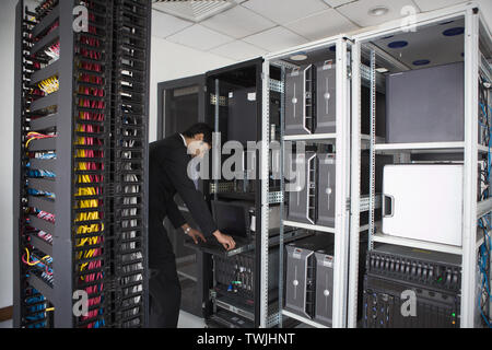 Technician working on server Stock Photo