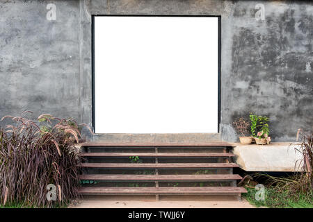 Empty gate with mortar wall with wooden up staircase and decoration garden Stock Photo