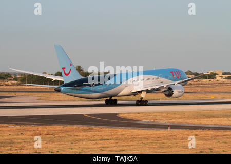 TUI Boeing 787-9 Dreamliner widebody commercial airliner taking off from the runway at Malta International Airport Stock Photo