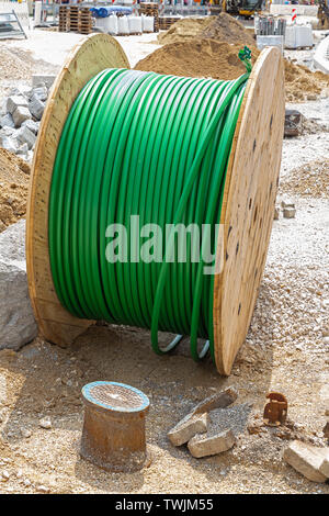 Cable drum with broadband cable on a cunstruction site Stock Photo
