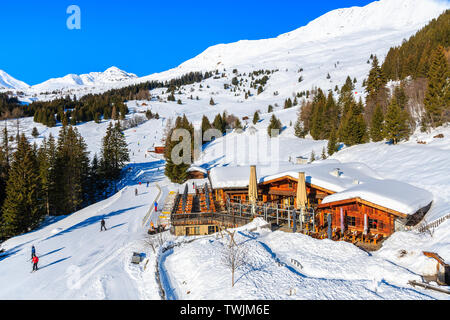 View of mountain hut restaurant on ski slope in Austrian Alps in beautiful winter season, Serfaus Fiss Ladis, Tirol, Austria. Stock Photo