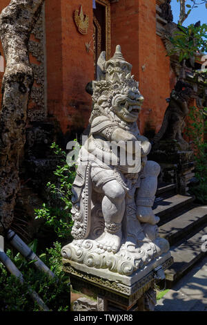 Balinese Bedogal, the demonic statues that act as guardians to puru (temples) and houses, Royal Palace, Ubud, Bali, Indonesia Stock Photo