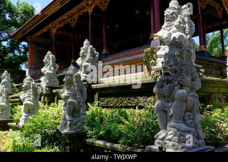 Balinese Bedogal, the demonic statues that act as guardians to puru (temples) and houses, Royal Palace, Ubud, Bali, Indonesia Stock Photo