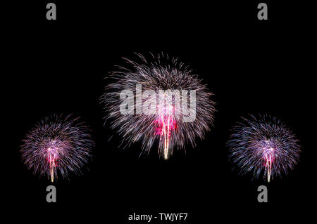 Celebration of colorful fireworks explosion, isolated on black background Stock Photo