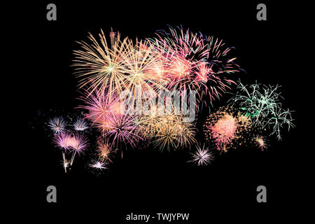 Colorful fireworks explosion on black background in annual festival Stock Photo