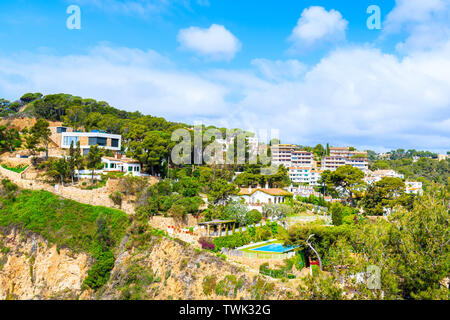 Villas on high cliff near sea in Tossa de Mar town, Costa Brava, Spain Stock Photo