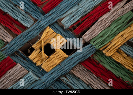 Close-up of colorful threads. Use for background or texture. authentic handmade craftwork Stock Photo