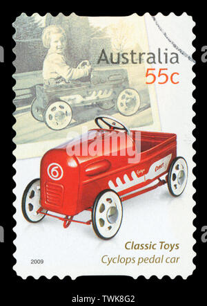 AUSTRALIA - CIRCA 2009: A stamp printed in Australia dedicated to classic toys, shows Cyclops pedal car, circa 2009. Stock Photo